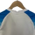 Imagem do Kit Infantil Napoli II 23/24 - EA7 - Branco com detalhes em azul e vermelho