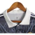 Image of Camisa Real Madrid Edição Especial Dragão 23/24 - Torcedor Adidas Masculina - Azul com detalhes em branco