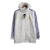 Jaqueta Corta-Vento Real Madrid 21/22 - Masculina Adidas - Branca com detalhes em azul e amarelo
