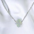Cadenita de Plata Con Dije de Opalina "Hamsa" en internet
