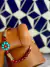 Pulseira Murano Vermelho com Peça Turquesa Nepal