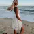 Imagem do Vestido branco para mulheres, bordado elegante, decote em v, vestido de praia, r