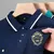 Camisa polo de manga curta bordada casual masculina, blusa de cor sólida, moda