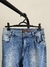 Calça jeans boca sino na internet