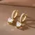 Aros dorados Corazon con circones