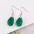 Aros Colgantes de plata 925 con dije de cristal de vidrio tono Esmeralda