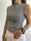 Musculosa Benilde