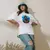 Camiseta Oversized Premium Branca Coleção Animais Africanos Estampa Camaleão Místico na internet