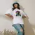 Camiseta Oversized Premium Branca e Preta Coleção César Tá em Casa Estampa Macaco Cesar - Loja Apaoká