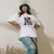 Camiseta Oversized Premium Branca e Preta Coleção César Tá em Casa Estampa Macaco Debochado - loja online