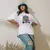 Camiseta Oversized Premium Branca e Preta Coleção César Tá em Casa Estampa Macaco Enfezado - Loja Apaoká