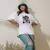 Imagem do Camiseta Oversized Premium Branca e Preta Coleção César Tá em Casa Estampa Macaco Sorridente