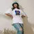 Camiseta Oversized Premium Branca Coleção Animais Africanos Estampa Coruja da Sabedoria na internet