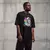 Camiseta Oversized Premium Branca e Preta Coleção César Tá em Casa Estampa Macaco Debochado - Loja Apaoká