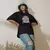 Camiseta Oversized Premium Branca e Preta Coleção César Tá em Casa Estampa Macaco Enfezado