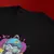 Camiseta Oversized Premium Branca e Preta Coleção César Tá em Casa Estampa Macaco Enfezado na internet