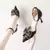 Zapatillas de tacón alto