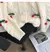 Suéter de lana con bordados navideños - Shop Dr.DJ