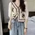 Blusa de ganchillo con bordado de flores - tienda en línea