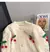 Suéter de lana con bordados navideños - comprar en línea
