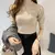 Blusa de punto de Cuello medio alto - tienda en línea