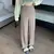 Traje caqui de cintura alta para mujer