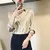 Blusa satinada formal