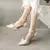 Zapatillas de tacón alto