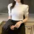 Blusa de punto de Cuello medio alto - comprar en línea