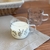 CANECA DE VIDRO FLORES 120ML na internet