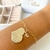 PULSEIRA CORRENTE CORAÇÃO BANHADA A OURO 18K - comprar online