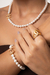 Pulseira Chanel com pérolas na internet