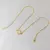 Colar choker trevo madrepérola dourado - comprar online