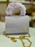 Bolsa Infantil Cor Lilás Alça de Mão Peludinha e Alça de Corpo Corrente