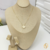 CONJUNTO MADREPEROLA FLOR DE TREVO BANHADO A OURO 18K na internet