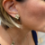 BRINCO TREVO INSPIRACAO BANHADA A OURO 18K