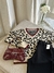 SWEATER ANIMAL PRINT BEIGE $38.500 ef-transferencia en internet