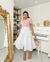Saia Midi Evasê com Botões - Elegante e Moderna