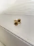 Anel inspiração alta joalheria círculos pretos - aço Inox dourado na internet