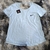 Remera drifit y microfibra Nk escote espalda