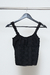 MUSCULOSA ENCAJE CON VOLADO