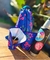 BOLSO TRIANGULAR MATERO AZUL FLORES