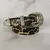 CINTO ANIMAL PRINT CON TACHAS M