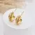 Argola com Fileira de Zircônia -Ouro 18k
