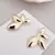 Brinco Meia Flor Moderna - Ouro 18k
