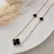 Colar Trevo Preto com Três Pedras Curto - Ouro 18k