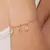 Pulseira com Botas e Ferradura Banhada a Ouro 18K | Cód. 552206 - comprar online