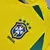 Camisa retrô amarela da Seleção Brasileira de Futebol, com o escudo da CBF e quatro estrelas bordadas.