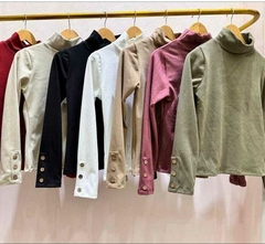POLERA NAZA CON BOTON en internet