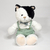 Gatinho preto e branco de camisa e macacão